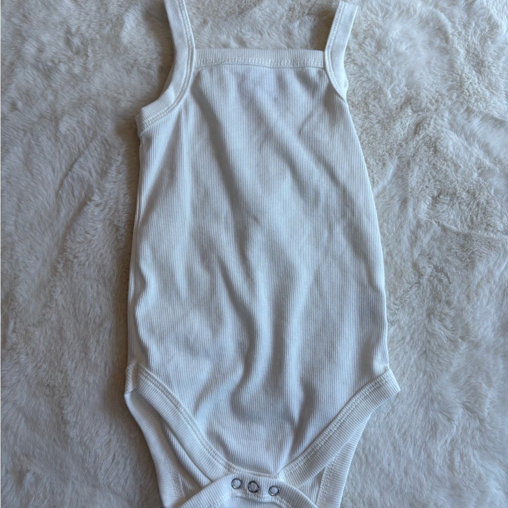 White Sleeveless Bodysuit with Snap Closure